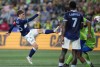 Vancouver Whitecaps midfielder Ryan Gauld takes a shot against the Seattle Sounders during the first half of an MLS soccer match Saturday, Oct. 7, 2023, in Seattle. The Whitecaps have rewarded Gauld with a contract extension through 2027.(AP Photo/Lindsey Wasson)