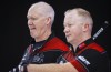 Team Ontario skip Glenn Howard, left, and third Scott Howard discuss strategy while playing Team Saskatchewan at the Tim Hortons Brier in Lethbridge, Alta., Tuesday, March 8, 2022. A three-man lineup has worked well at times for the members of Team Glenn Howard. They're hoping a shorthanded setup will lead to success again this week at the Ontario curling championship. THE CANADIAN PRESS/Jeff McIntosh