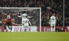 Bournemouth's Lloyd Kelly, right, scores his side's first goal of the game during the English FA Cup Fourth Round soccer match between AFC Bournemouth and Swansea City at the Vitality Stadium, Bournemouth, England, Thursday, Jan. 25, 2024. (Andrew Matthews/PA via AP)