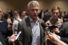 FILE - Baltimore Orioles general manager Mike Elias, center, responds to questions during the Major League Baseball winter meetings Dec. 5, 2023, in Nashville, Tenn. Elias is preaching patience during what has been another quiet offseason for Baltimore. (AP Photo/George Walker IV, File)