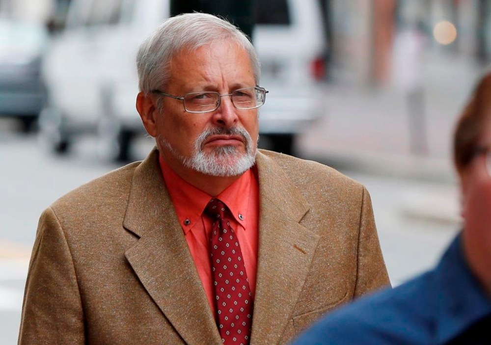 FILE - Michael Geilenfeld arrives at U.S. Bankruptcy Court, July 9, 2015, in Portland, Maine. Geilenfeld, a U.S. founder of a Haitian orphanage, forced four boys who lived in the institution to engage in sexual acts more than a decade ago, and authorities fear he or his supporters may try to intimidate victims trying to seek justice, a prosecutor said Friday, Jan. 26, 2024. (AP Photo/Robert F. Bukaty, File)