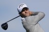Thomas Detry watches his tee shot on the second hole of the Sorth Course at Torrey Pines during the third round of the Farmers Insurance Open golf tournament, Friday, Jan. 26, 2024, in San Diego. (AP Photo/Gregory Bull)