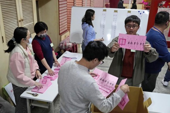Polling officers count votes in New Taipei City, Taiwan, on Jan. 13. (Ng Han Guan / The Associated Press)