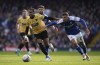 Maidstone United's Lamar Reynolds, left, and Ipswich Town's Dominic Ball battle for the ball during the English FA Cup fourth round soccer match between Ipswich Town and Maidstone United at Portman Road, in Ipswich, England, Saturday, Jan. 27, 2024. (Joe Giddens/PA via AP)