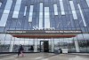 A person leaves Sheridan College's Hazel McCallion Campus in Mississauga, Ont., on Friday, January 26, 2024. THE CANADIAN PRESS/Nathan Denette