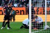 Munich's Kingsley Coman, 2nd right, receives medical treatment during the Bundesliga soccer match between FC Augsburg and Bayern Munich at the WWK-Arena, Augsburg, Germany, Saturday Jan. 27, 2024. (Sven Hoppe/dpa via AP)