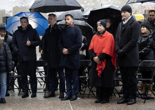 Prime Minister Justin Trudeau stands with Canada's Special Envoy on Preserving Holocaust Remembrance and Combatting Antisemitism Deborah Lyons, Ontario Minister of Education Stephen Lecce, Conservative MP for Leeds-Grenville-Thousand Islands and Rideau Lakes Michael Barrett and Conservative leader Pierre Poilievre stand during a service marking the 79th anniversary of the liberation of the Auschwitz-Birkenau concentration camp at the National Holocaust Memorial, in Ottawa, Friday, Jan. 26, 2024. THE CANADIAN PRESS/Adrian Wyld