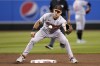 FILE - Baltimore Orioles second baseman Adam Frazier takes a throw down to second base during the first inning of a baseball game against the Arizona Diamondbacks Friday, Sept. 1, 2023, in Phoenix. The Kansas City Royals and Frazier agreed to a $4.5 million, one-year contract to provide the club with a left-handed bat and some versatility in the lineup, a person with knowledge of the deal told The Associated Press on Saturday, Jan. 27, 2024. (AP Photo/Ross D. Franklin, File)