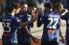 Atalanta's Gianluca Scamacca celebrates scoring a goal with teammates, during an Italian Serie A soccer match between Atalanta and Udinese Calcio at Gewiss Stadium in Bergamo, Italy, Saturday, Jan 27, 2024. (Spada/LaPresse via AP)