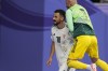 Iraq's Aymen Hussein, centre, celebrates after scoring his side's second goal during the Asian Cup Round of 16 soccer match between Iraq and Jordan, at Khalifa International Stadium in Doha, Qatar, Monday, Jan. 29, 2024. (AP Photo/Thanassis Stavrakis)