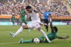 Cape Verde's Ryan Mendes, left, is tackled by Mauritania's Ibrahima Keita during the African Cup of Nations round of 16 soccer match between Cape Verde and Mauritania at the Felix Houphouet-Boigny stadium in Abidjan, Ivory Coast, Monday, Jan. 29, 2024. (AP Photo/Sunday Alamba)