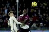 Roma's Diego Llorente, left, in action against Salernitana's Nwanko Simy during the Italian Serie A soccer match between Salernitana and AS Roma at the Arechi stadium in Salerno, Italy, Monday, Jan. 29, 2024. (Alessandro Garofalo/LaPresse via AP)