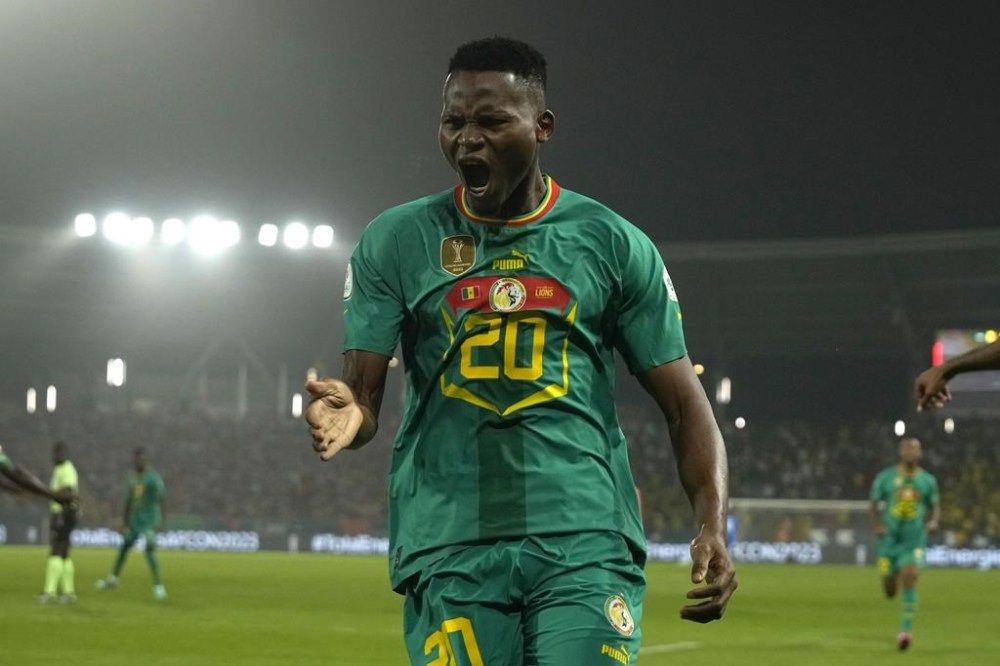 Senegal's Habib Diallo celebrates after scoring his side's opening goal during the African Cup of Nations round of 16 soccer match between Senegal and Ivory Coast, at the Charles Konan Banny stadium in Yamoussoukro, Ivory Coast, Monday, Jan. 29, 2024. (AP Photo/Themba Hadebe)