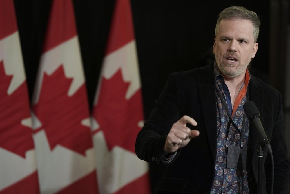 Health Minister Mark Holland speaks to the media during the federal cabinet retreat in Montreal, Monday, Jan. 22, 2024. Most provinces and territories are asking the federal government to