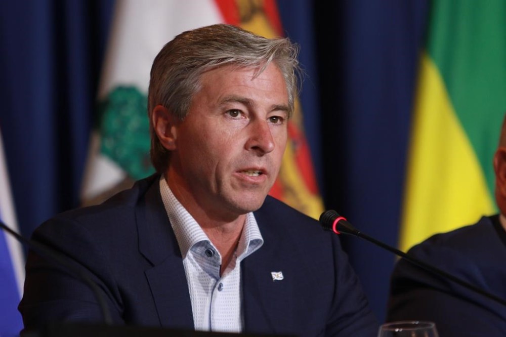 The Nova Scotia government has launched a pilot project that will give 12,000 residents access to their medical records through a provincial mobile application. Nova Scotia Premier Tim Houston responds to a question at the Fairmont Empress in Victoria, B.C., on Tuesday, July 12, 2022. THE CANADIAN PRESS/Chad Hipolito