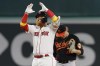 FILE - Boston Red Sox's Justin Turner celebrates his RBI double during the sixth inning of a baseball game against the Baltimore Orioles, Friday, Sept. 8, 2023, in Boston. Infielder Justin Turner and the Toronto Blue Jays have agreed to a $13 million, one-year contract, a person familiar with the deal told The Associated Press. The person spoke on condition of anonymity Tuesday, Jan. 30, 2024, because the agreement for the 39-year-old was subject to a successful physical. (AP Photo/Michael Dwyer, File)