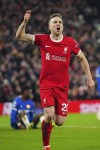 Liverpool's Diogo Jota celebrates after scoring his side's first goal during the English Premier League soccer match between Liverpool and Chelsea, at Anfield Stadium, Liverpool, England, Wednesday, Jan.31, 2024. (AP Photo/Jon Super)