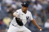FILE -New York Yankees pitcher Wandy Peralta (58) pitches against the Milwaukee Brewers during the seventh inning of a baseball game Saturday, Sept. 9, 2023, in New York. Free-agent reliever Wandy Peralta and the San Diego Padres have agreed to a $16.5 million, four-year contract, pending a physical exam, a person with knowledge of the deal said Wednesday, Jan. 31, 2024. (AP Photo/Adam Hunger, FGile)