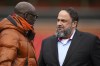Nottingham Forest owner Evangelos Marinakis, right, speaks with former soccer player Lilian Thuram, during the Racial and Gender Equity in European Football Conference, at the City Ground, in Nottingham, England, Wednesday, Jan. 31, 2024. The conference aims at tackling the issues of racism and gender inequality in European Football. (Mike Egerton/PA via AP)