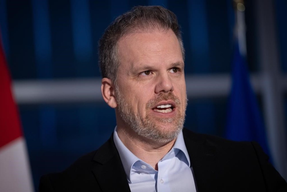 Federal Health Minister Mark Holland makes an announcement in Calgary on Thursday, Dec. 21, 2023. THE CANADIAN PRESS/Todd Korol