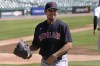FILE - Cleveland Indians starting pitcher Carlos Carrasco walks to the dugout after striking out Detroit Tigers' Miguel Cabrera in the first inning of a baseball game, Sunday, Sept. 20, 2020, in Detroit. Carrasco is coming back to Cleveland. The right-hander officially signed a minor league contract with the Guardians on Thursday, Feb. 1, 2024, with an invitation to camp at spring training. Carrasco's return was reported previously by the AP and other media outlets last weekend.(AP Photo/Jose Juarez, File)