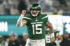 New York Jets quarterback Chris Streveler (15) celebrates after tight end Lawrence Cager runs in a touchdown during the second half of an NFL football game against the Atlanta Falcons, Monday, Aug. 22, 2022, in East Rutherford, N.J. Streveler signed a one-year deal with the Winnipeg Blue Bombers on Wednesday, returning to where he began his pro football career in 2018. THE CANADIAN PRESS/AP-John Munson
