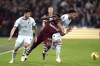 West Ham United's Mohammed Kudus, center, battles for the ball with Bournemouth's Marcos Senesi, left, and Lloyd Kelly during the English Premier League soccer match between West Ham and Bournemouth at the London Stadium, London, Thursday, Feb. 1, 2024. (Adam Davy/PA via AP)