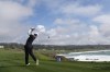 Xander Schauffele hits from the eighth tee on the Pebble Beach Golf Links during the first round of the AT&T Pebble Beach National Pro-Am golf tournament Thursday, Feb. 1, 2024, in Pebble Beach, Calif. (AP Photo/Ryan Sun)