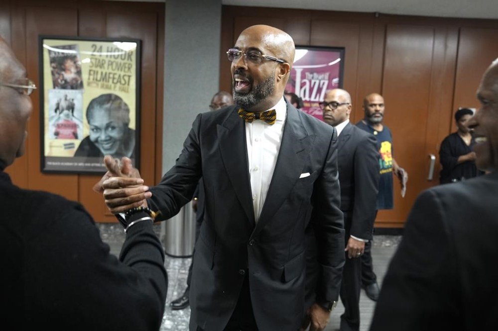 The Rev. Frederick D. Haynes III is greeted in Dallas, Thursday, Feb. 1, 2024. The civil rights group founded by the Rev. Jesse Jackson in the 1970s is elevating a new leader for the first time in more than 50 years, choosing Haynes as his successor to take over the Rainbow PUSH Coalition. (AP Photo/LM Otero)