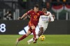 Roma's Stephan El Shaarawy, left, challenges for the ball with Verona's Jackson Tchatchoua during the Series A soccer match between Roma and Hellas Verona at the Rome Olympic stadium, Saturday, Jan. 20, 2024. (AP Photo/Andrew Medichini)