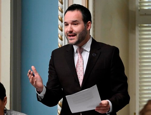 Quebec Culture and Communication Minister Mathieu Lacombe responds to the Opposition during question period, Wednesday, April 26, 2023, at the legislature in Quebec City. Quebec is considering legislation to boost French content on streaming platforms as it seeks to fight back against the overwhelming influence of American digital culture and corporations.THE CANADIAN PRESS/Jacques Boissinot