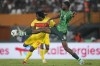 Nigeria's Semi Ajayi, right, challenges Angola's Mabululu during the African Cup of Nations quarterfinal soccer match between Nigeria and Angola, at the Felix Houphouet Boigny stadium in Abidjan, Ivory Coast, Friday, Feb. 2, 2024. 2024. (AP Photo/Sunday Alamba)
