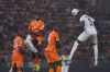 Mali's Kiki Kouyate, right, heads the ball during the African Cup of Nations quarter final soccer match between Mali and Ivory Coast, at the Peace of Bouake stadium in Bouake, Ivory Coast, Saturday, Feb. 3, 2024. (AP Photo/Sunday Alamba)