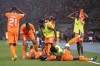 Ivory Coast players celebrate after Ivory Coast 's Oumar Diakite scored his side's second goal during the African Cup of Nations quarter final soccer match between Mali and Ivory Coast, at the Peace of Bouake stadium in Bouake, Ivory Coast, Saturday, Feb. 3, 2024. (AP Photo/Sunday Alamba)