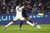 Canadian international Jonathan David scored twice to help Lille blank Clermont 4-0 in French Ligue 1 soccer play Sunday. Lyon's Sinaly Diomande, left, and David challenge for the ball during the French League One soccer match between Lyon and Lille at the Groupama stadium, outside Lyon, France, Sunday, Nov. 26, 2023. THE CANADIAN PRESS/AP-Laurent Cipriani