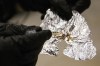 FILE - BART police Officer Eric Hofstein displays the fentanyl he confiscated while patrolling the Civic Center Station BART platform in San Francisco, Nov. 20, 2020. The Democratic mayor of San Francisco is pushing a pair of controversial public safety proposals on the March 5, 2024, ballot. Critics say the measures are out of step with San Francisco's liberal politics and will hurt already marginalized communities. (Jessica Christian/San Francisco Chronicle via AP, File)