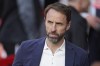 FILE - England's Manager Gareth Southgate waits for the start of the Euro 2024 group C qualifying soccer match between England and North Macedonia at Old Trafford in Manchester, Monday June 19, 2023. England will prepare for the European Championship by playing warmup games against Bosnia-Herzegovina and Iceland in the days leading up to the tournament. The first ever meeting against Bosnia-Herzegovina will take place at Newcastle’s St. James’ Park on June 3. The game against Iceland will be at Wembley Stadium on June 7. (AP Photo/Dave Thompson, File)