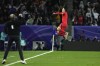 South Korea's Son Heung-min, right, celebrates after scoring as South Korea's head coach Jurgen Klinsmann cheers him during the Asian Cup quarterfinal soccer match between Australia and South Korea at Al Janoub Stadium in Al Wakrah, Qatar, Friday, Feb. 2, 2024. (AP Photo/Thanassis Stavrakis)