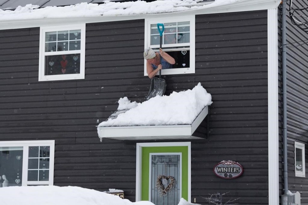 Crews clean up after a winter storm in Sydney, N.S. on Monday, Feb.5, 2024. THE CANADIAN PRESS/Shane Wilkie