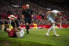 Manchester United's Lisandro Martinez grimaces after a contact with West Ham's Vladimir Coufal, right, during the English Premier League soccer match between Manchester United and West Ham United at the Old Trafford stadium in Manchester, England, Sunday, Feb. 4, 2024. (AP Photo/Dave Thompson)