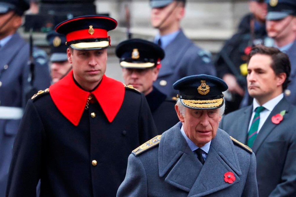 FILE - Britain's King Charles III, right, and Prince William attend the annual Remembrance Sunday ceremony at the Cenotaph in London, Sunday, Nov. 12, 2023. King Charles III has been diagnosed with a form of cancer and has begun treatment, Buckingham Palace says on Monday, Feb. 5, 2024. (Toby Melville/Pool Photo via AP, File)