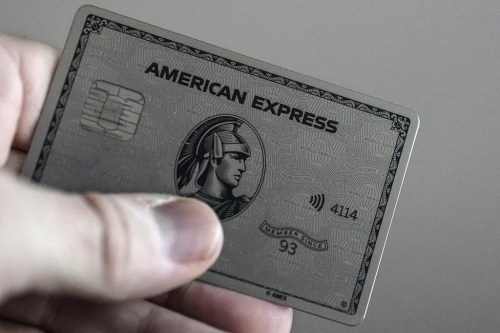 An American Express card is shown, Thursday, Jan. 18, 2024, in Atlanta. A combination of inflation, increased interest rates, and the end of pandemic-tied relief, such as the moratorium on student loan payments, has led to record credit card debt, experts say. (AP Photo/Mike Stewart)