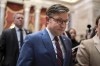 Speaker of the House Mike Johnson, R-La., maneuvers past reporters asking about the Senate border security bill as he arrives at his office in the Capitol, in Washington, Monday, Feb. 5, 2024. Johnson has declared the bipartisan bill 