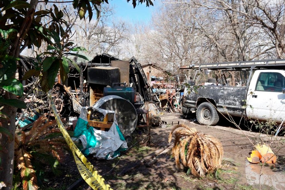 Damage is seen after a deadly house fire on Feb. 3, 2024, in Houston. A Texas mother and her 1-year-old son died after a fire engulfed their Houston home, but not before she was able to rescue her two other children, according to authorities. (Hana Ikramuddin/Houston Chronicle via AP)