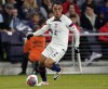 FILE - United States defender Sergiño Dest plays against Ghana during the second half of an international friendly soccer match Oct. 17, 2023, in Nashville, Tenn. United States coach Gregg Berhalter plans to have Dest at the team's training camp for the CONCACAF Nations League final four next month, even though the defender is suspended for the March 21 semifinal against Jamaica. (AP Photo/George Walker IV, File)