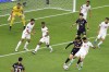 South Korea's Son Heung-min, bottom left, mounts an attack as Jordan's Nizar Alrashdan fights back during the Asian Cup semifinal soccer match between South Korea and Jordan at Ahmad Bin Ali Stadium in Al Rayyan, Qatar, Tuesday, Feb. 6, 2024. (AP Photo/Hussein Sayed)