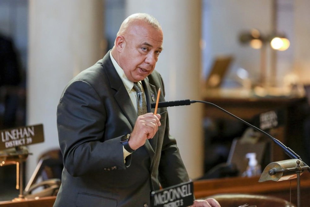 FILE - Neb. State Sen. Tom Brewer of Gordon speaks during debate, Jan. 8, 2018, in the Legislative Chamber in Lincoln, Neb. Brewer's bill, which would allow teachers and other staff in schools to be armed in the hopes of deterring school shootings, drew dozens of people and some emotional testimony to the Nebraska Legislature’s Education Committee on Tuesday, Feb. 6, 2024. (AP Photo/Nati Harnik, File)