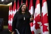 Federal Housing Advocate Marie-Josée Houle leaves a news conference in Ottawa on Monday, Nov. 27, 2023. As provinces look to hotels to provide temporary housing to people living in homeless encampments, Houle says governments must take their cues from the unhoused people they're trying to serve and look for permanent solutions. THE CANADIAN PRESS/Justin Tang