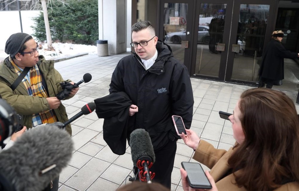 Defence lawyer Jon Doody for Cameron Jay Ortis leaves the courthouse in Ottawa on Wednesday, Feb. 7, 2024. The former RCMP intelligence official Ortis has been sentenced to 14 years in prison for breaching Canada's secrets law. THE CANADIAN PRESS/ Patrick Doyle