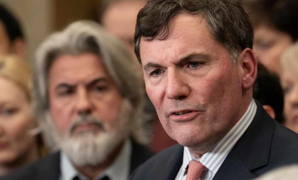 Minister of Transport Pablo Rodriguez looks on as Minister of Public Safety, Democratic Institutions and Intergovernmental Affairs Dominic LeBlanc speaks about auto theft in Canada, Wednesday, February 7, 2024 in Ottawa. THE CANADIAN PRESS/Adrian Wyld